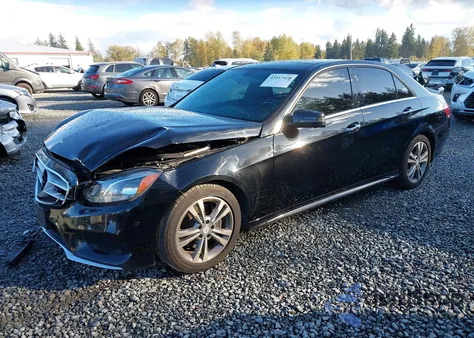 2015 Mercedes-Benz E 250 Bluetec из США, поврежденный, VIN WDDHF0EB4FB113951